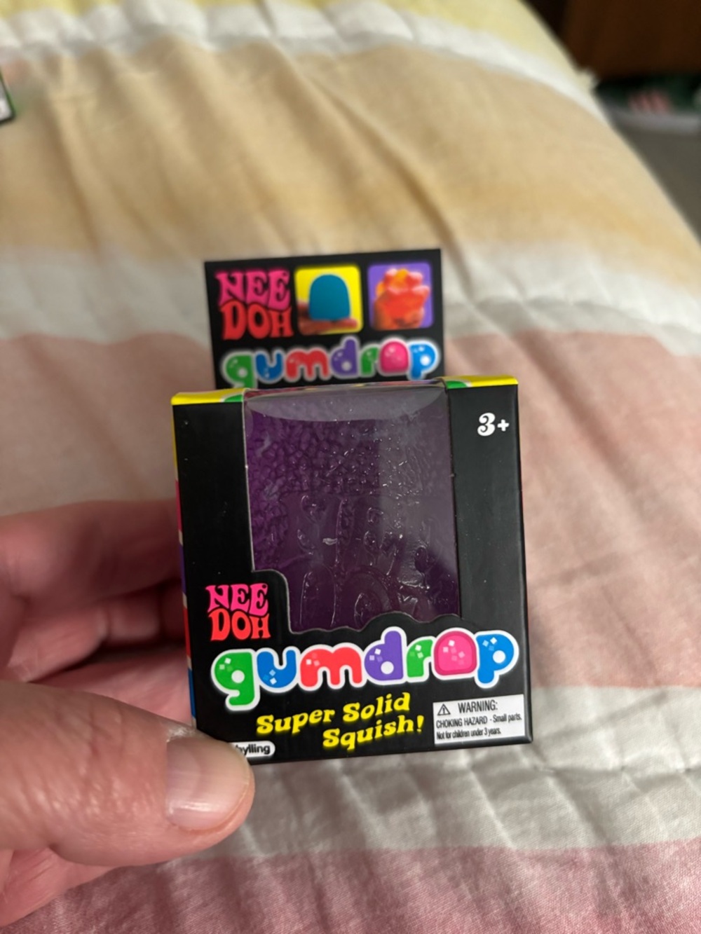 purple NeeDoh Gumdrop Super Solid Squish Toy